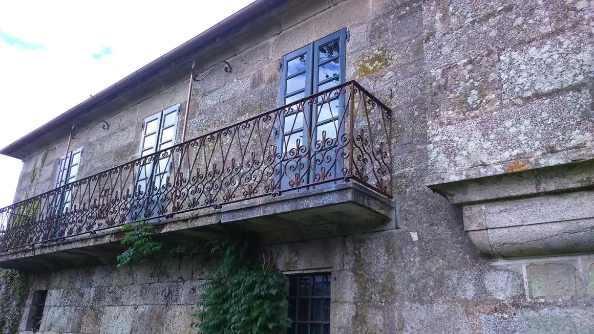 Classic Balcony: Stone Base for a Wrought-Iron Railing