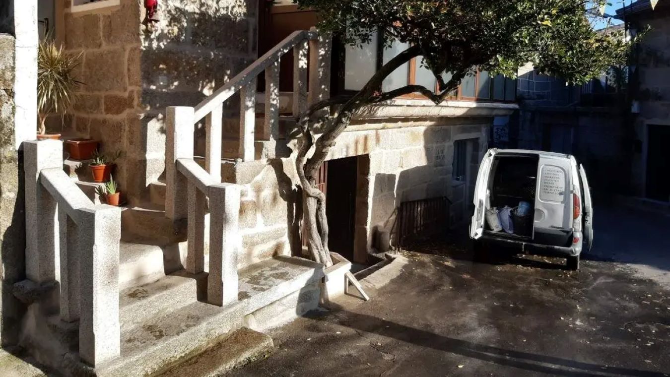 Rustic Staircase with Straight Stone Handrails